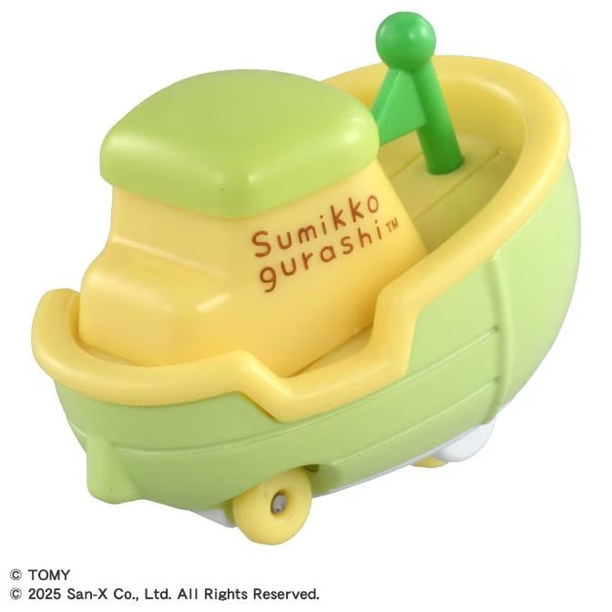  Sumikko Gurashi pudding boat toy with green accents and wheels.