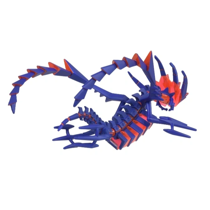 Blue and red toy dragon with segmented body and sharp spikes.
