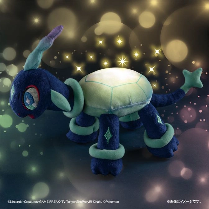 Dewgong-like plush toy with a shell, blue body, and green accents.