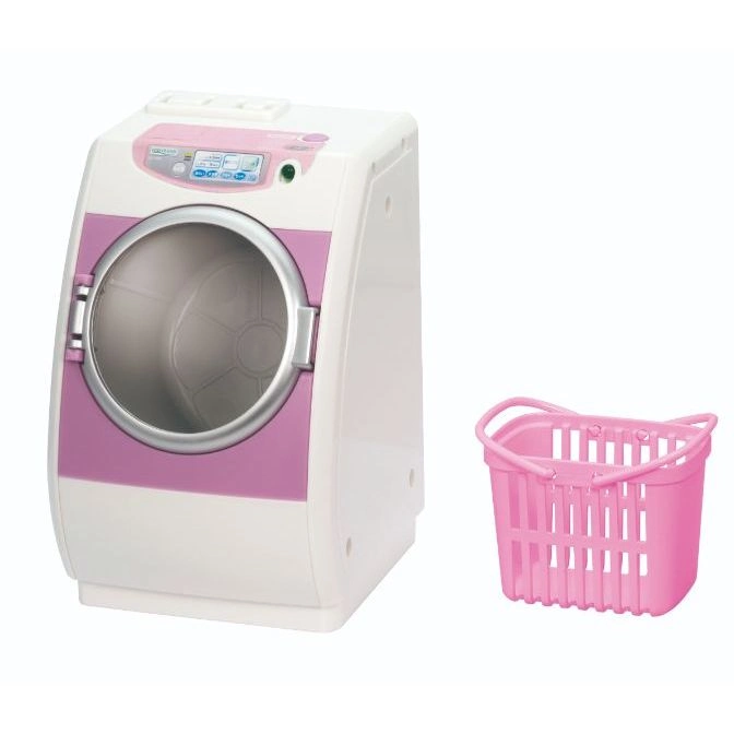  Toy washing machine with pink accents and a matching pink laundry basket.
