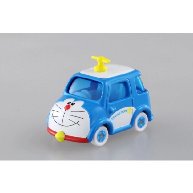 Doraemon toy car with yellow propeller on top, blue body, and white face with whiskers.