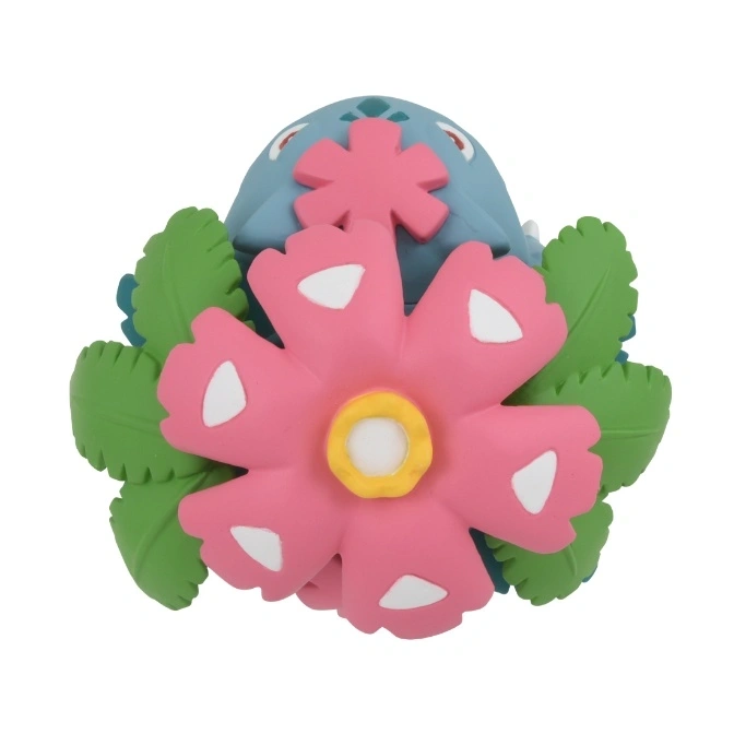  Wigglytuff flower toy with pink petals, green leaves, and a blue head.