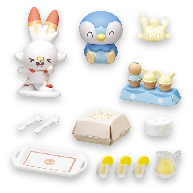 Pokémon toy set featuring Scorbunny, Piplup, and food items like ice cream, burger, and lemonade.