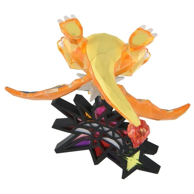  Charizard toy figure on a black star base, viewed from below, showing its feet and tail flame.