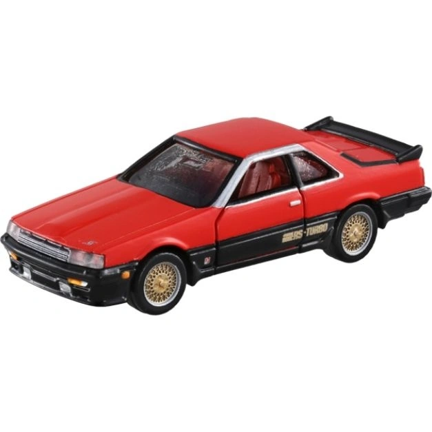 Red toy Nissan Skyline R30 with gold wheels and black trim.