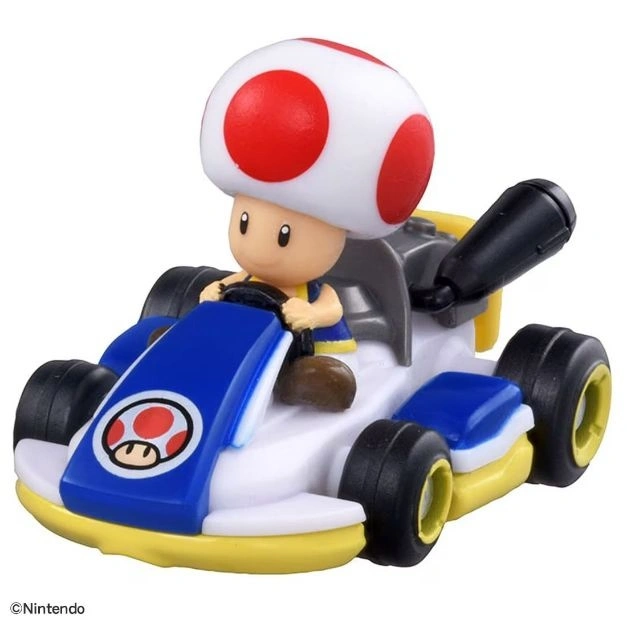  Toad in a blue and white Mario Kart with yellow accents and black tires.