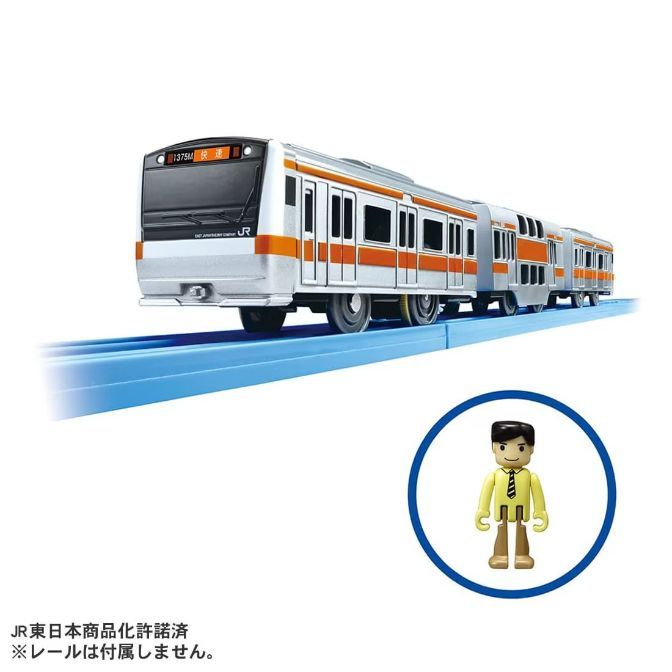 A toy train set with a silver and orange train on blue tracks, and a small plastic figure of a man in a yellow shirt and tie.