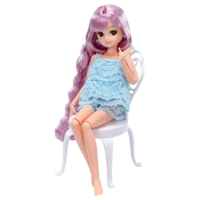  Doll with lavender hair in blue lace top and shorts sitting on a white chair.