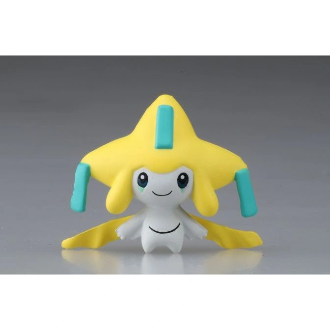  Jirachi toy figure with yellow star-shaped head and teal accents, smiling.