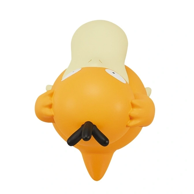  Psyduck toy figure with yellow body, white head, and black beak.