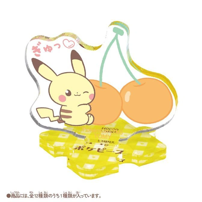  Pikachu cherry acrylic stand featuring a winking Pikachu next to two cherries on a yellow patterned base.