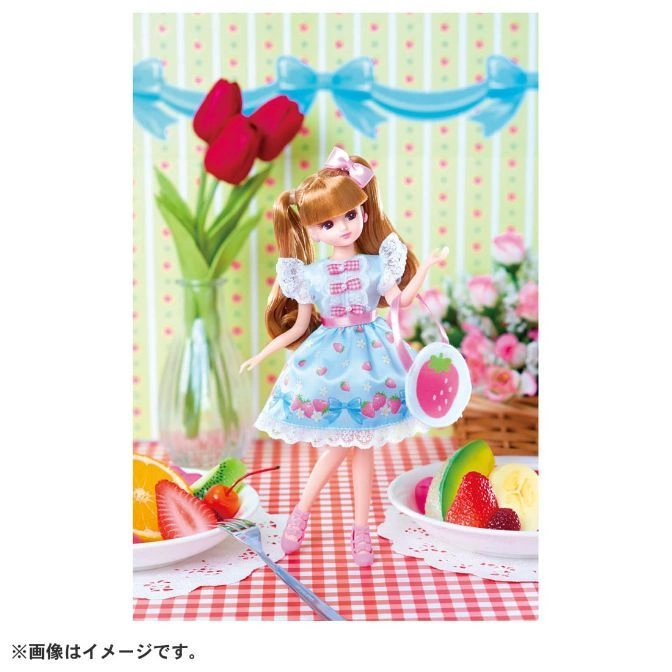  Licca doll in a strawberry dress with fruit, tulips, and a pink bow.