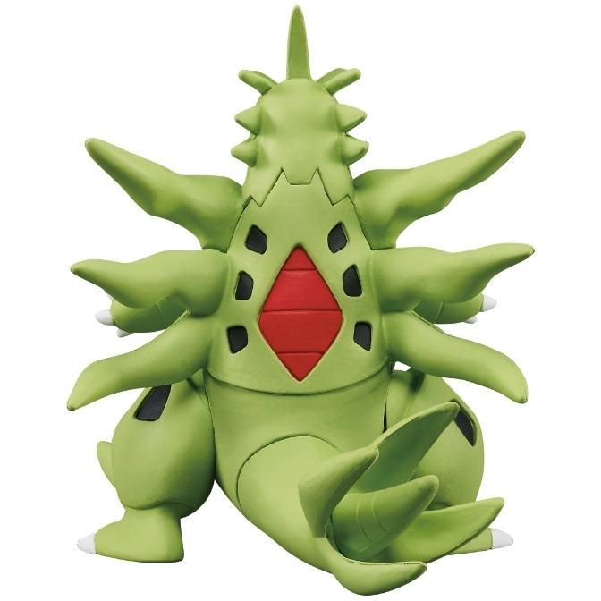  Green Tyranitar toy figure with red diamond on back, facing away.