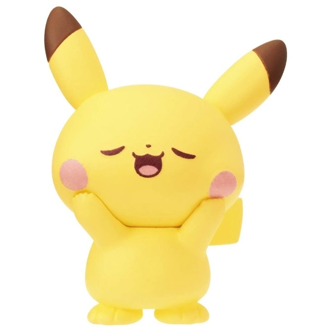 Yellow Pikachu toy with closed eyes, pink cheeks, and brown-tipped ears.