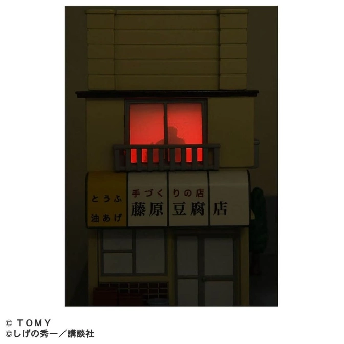  Fujiwara Tofu Shop toy building with lit window showing a silhouette.