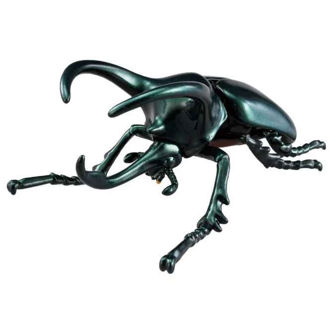 Green toy stag beetle with large mandibles and detailed legs.