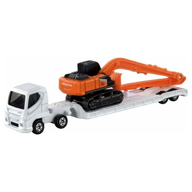 Toy Hitachi excavator on a white flatbed truck. Orange excavator with black treads.