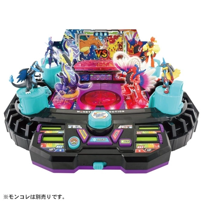Pokémon battle arena toy with figures, HP gauges, buttons, and a VS screen featuring Pikachu and Charizard.