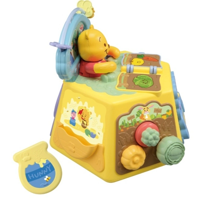  Winnie the Pooh activity cube with garden-themed knobs, flip panels, and a honey pot accessory.