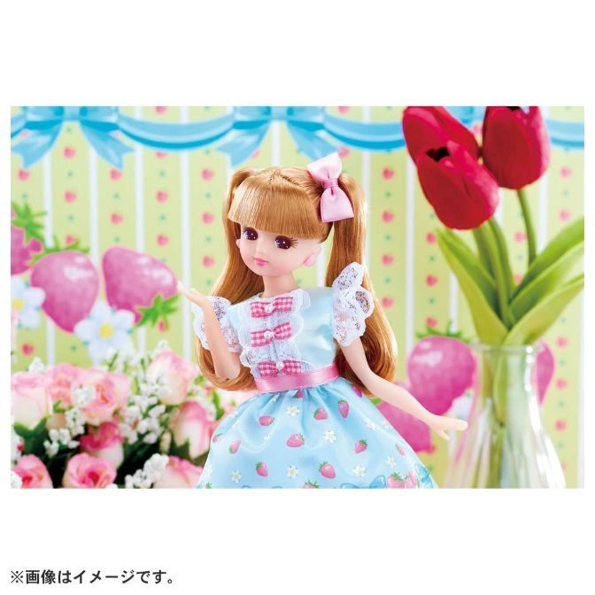  Strawberry-themed Licca doll with blonde hair in pigtails and a light blue dress.