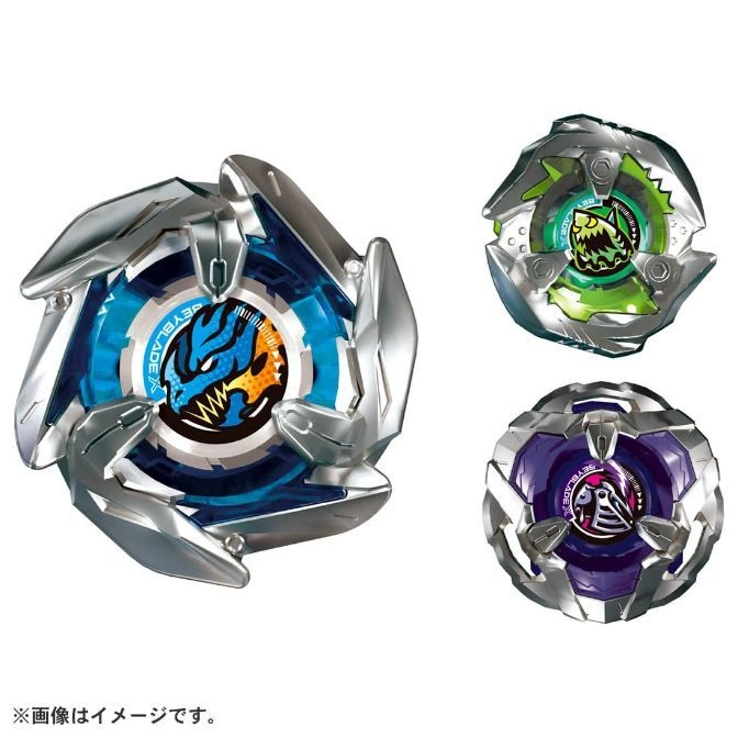 Three Beyblade spinning tops: blue dragon, green shark, and purple bird designs.