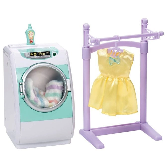  Toy washing machine with clothes inside and a yellow dress on a clothes rack.