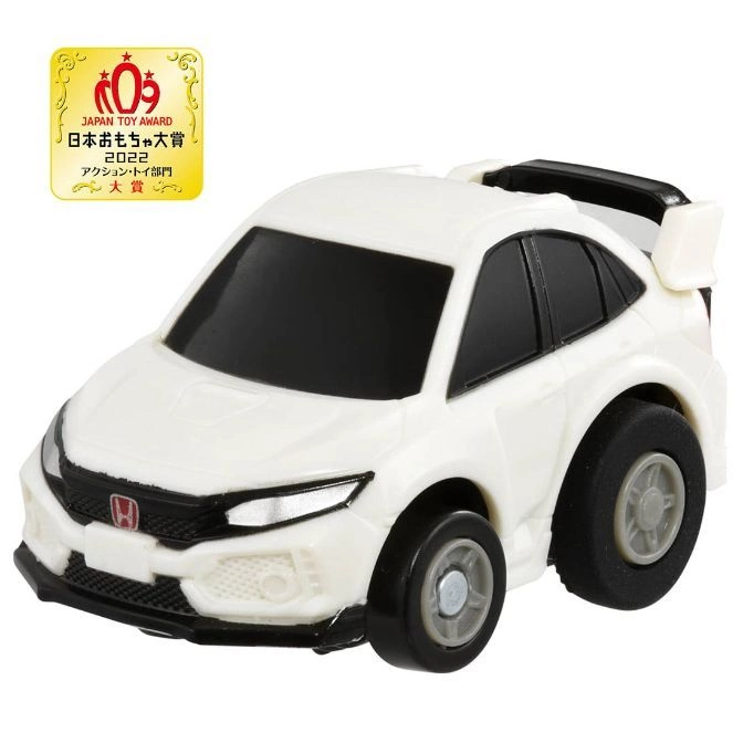 White toy car with black accents and large wheels, winner of the Japan Toy Award 2022.