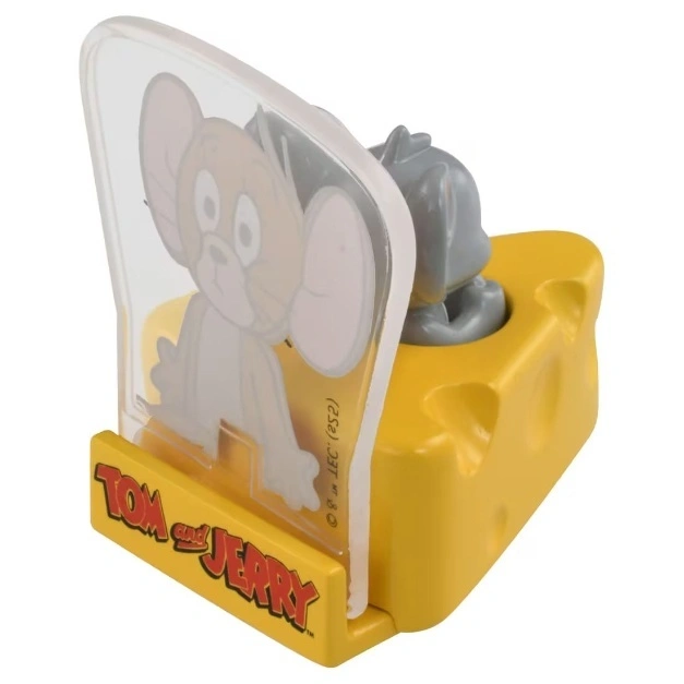  Tom and Jerry toy featuring Jerry behind clear plastic, set in yellow cheese base with mouse figure.