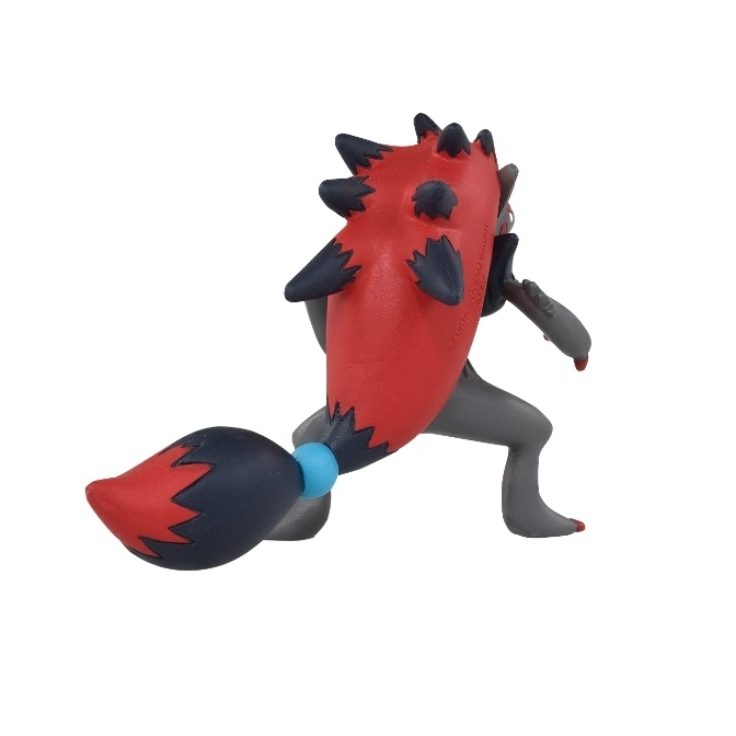  Zoroark Pokémon toy figure with red and black spiky hair and tail, in a running pose.
