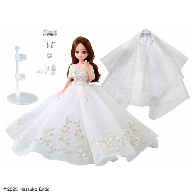 Licca-chan doll in a white wedding dress with accessories: veil, tiara, jewelry, shoes, and stand.