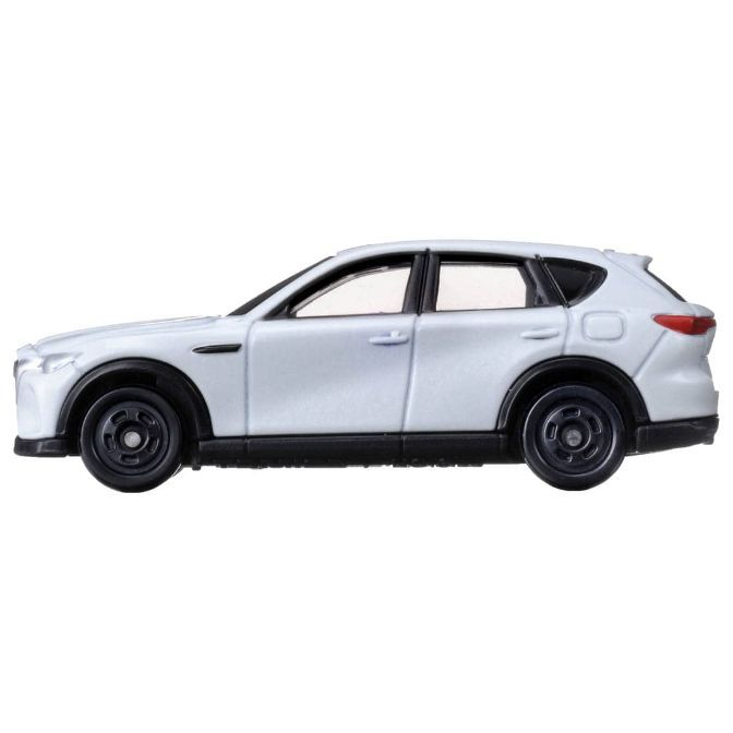  White Mazda CX-60 toy car, side view. Black wheels and trim.