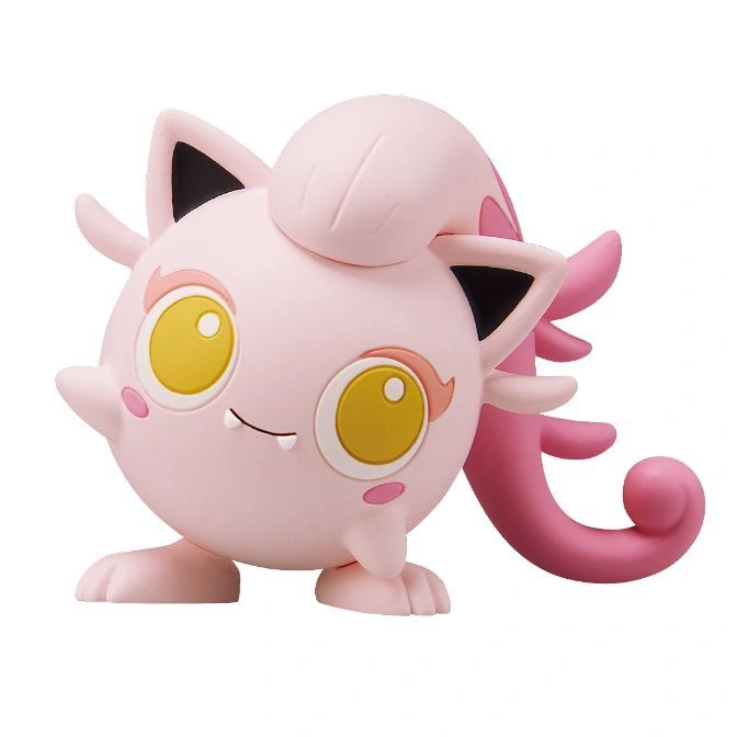 Pink Igglybuff toy figure with big yellow eyes and a curly tail.