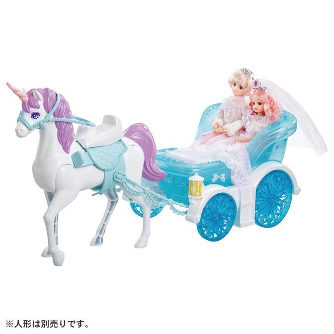  Toy unicorn pulling a carriage with two dolls dressed in wedding attire.