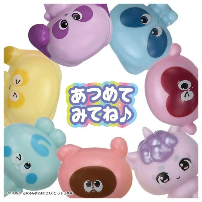  Round, colorful animal toys arranged in a circle, each with unique features and expressions.