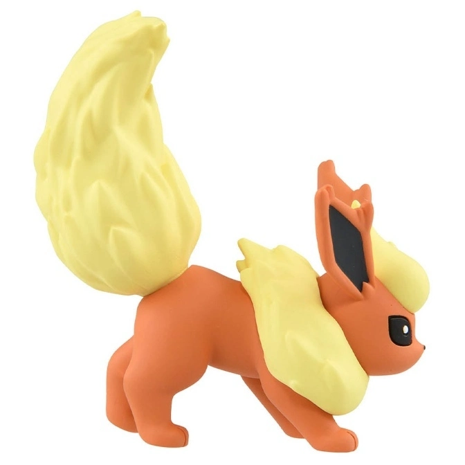  Flareon toy figure with orange body and fluffy yellow tail and mane.