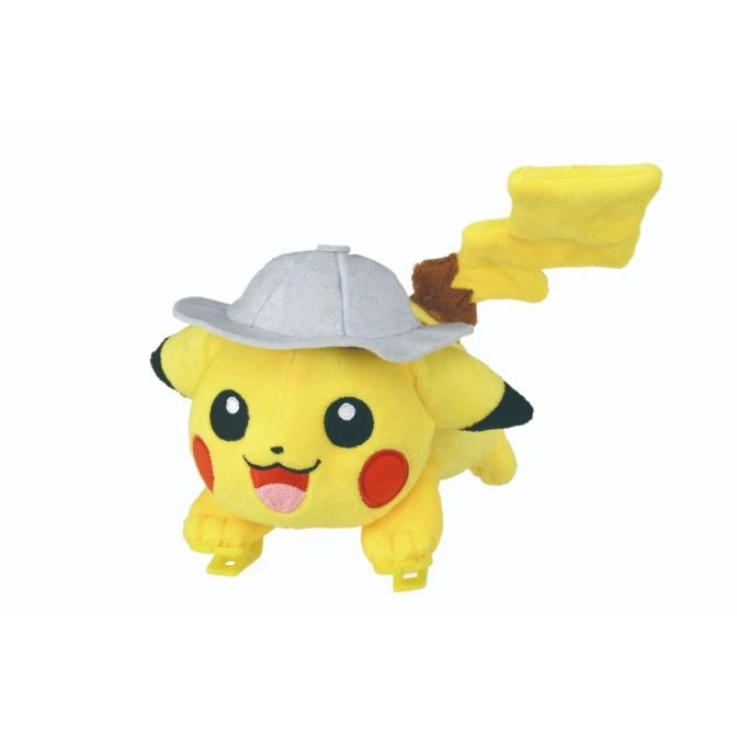  Pikachu plush toy wearing a grey hat, standing with its tongue sticking out.