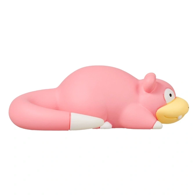  Pink Slowpoke toy lying down with a white-tipped tail and yellow snout.