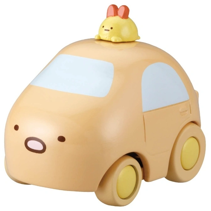 Tan Sumikko Gurashi car toy with a yellow character wearing a red bow on top.