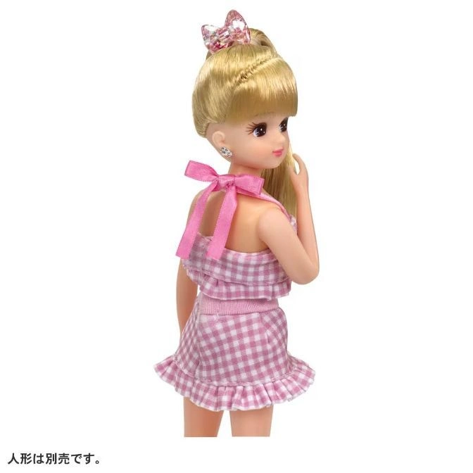  Licca doll in pink gingham dress with bow. Blonde hair with pink bow.