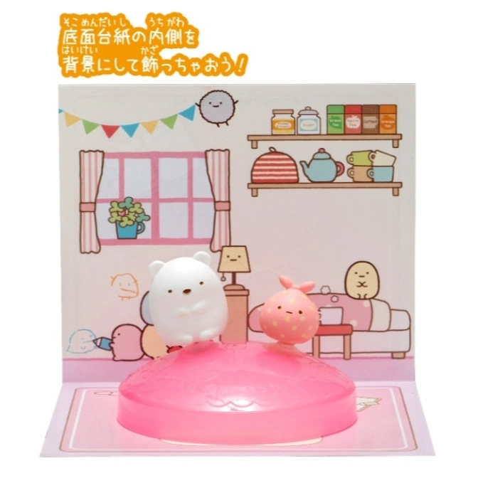  Sumikko Gurashi playset with bear and strawberry figures on a pink base, against a room backdrop.