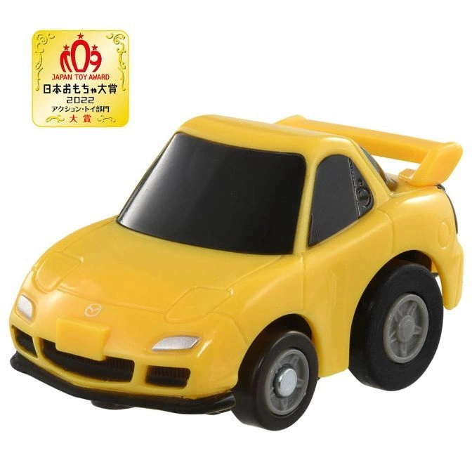 Yellow toy Mazda RX-7 with spoiler, Japan Toy Award logo visible.