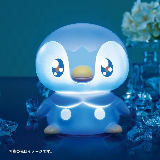  Illuminated Piplup nightlight with glowing blue features and yellow beak.