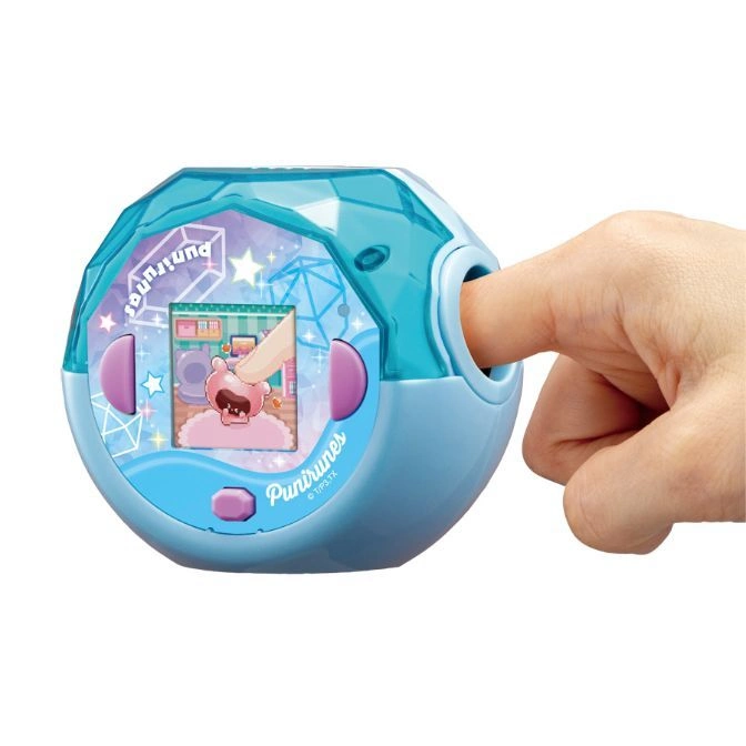  Blue Punirunes toy with a finger interacting with it, showing a character on the screen.