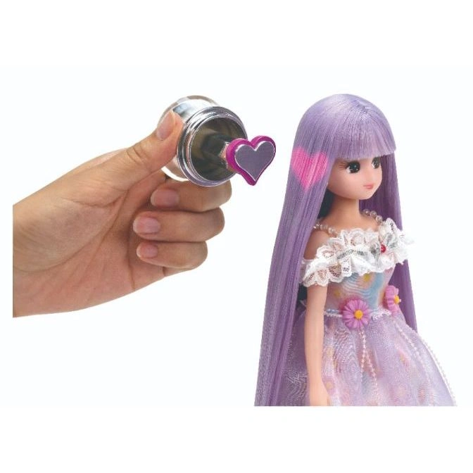  Doll with purple hair getting pink heart stamps applied to her hair with a stamper.