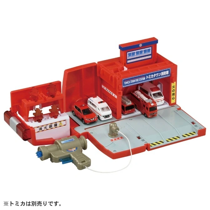 Tomica Town Fire Station playset with toy vehicles and a water gun, simulating fire rescue scenarios.