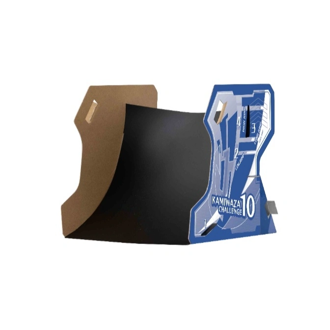  Kamikaza Challenge 10 toy ramp with jump height settings, brown cardboard support.