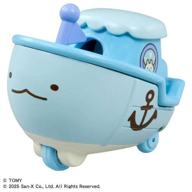 Light blue boat toy with a smiling face, anchor, and wheels.