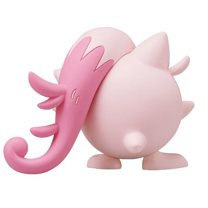  Pink toy figure with a trunk-like appendage, standing on small feet.