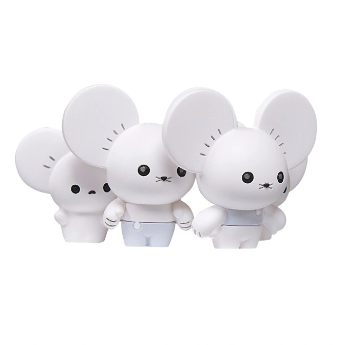  Three white mouse-shaped toys with large ears and overalls, standing in a row.