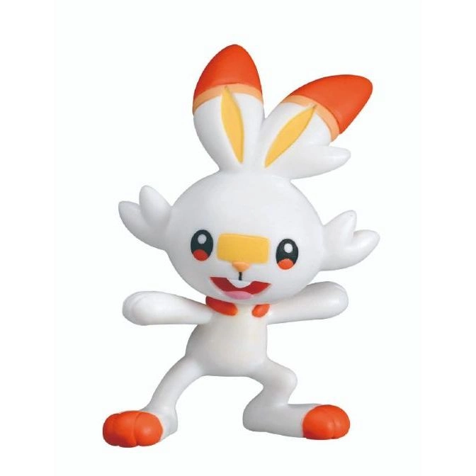  Scorbunny toy figure with orange accents, standing in a playful pose.